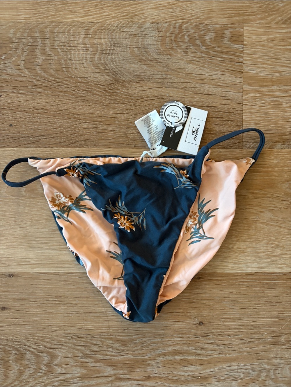 O'Neill Reversible Floral Swim Bottoms — Navy & Peach